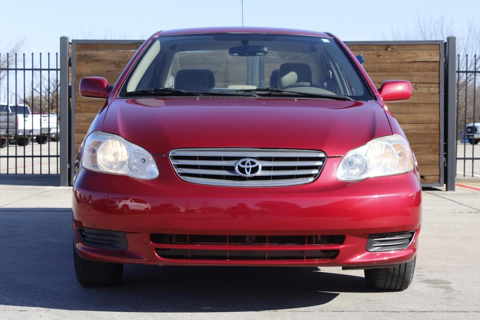 2004 red Toyota Corolla LE (1NXBR32E64Z) with an 1.8L L4 DOHC 16V engine, located at 2401 E Main St., Grand Prairie, TX, 75050, (972) 262-4440, 32.748981, -96.969643 - Photo#0