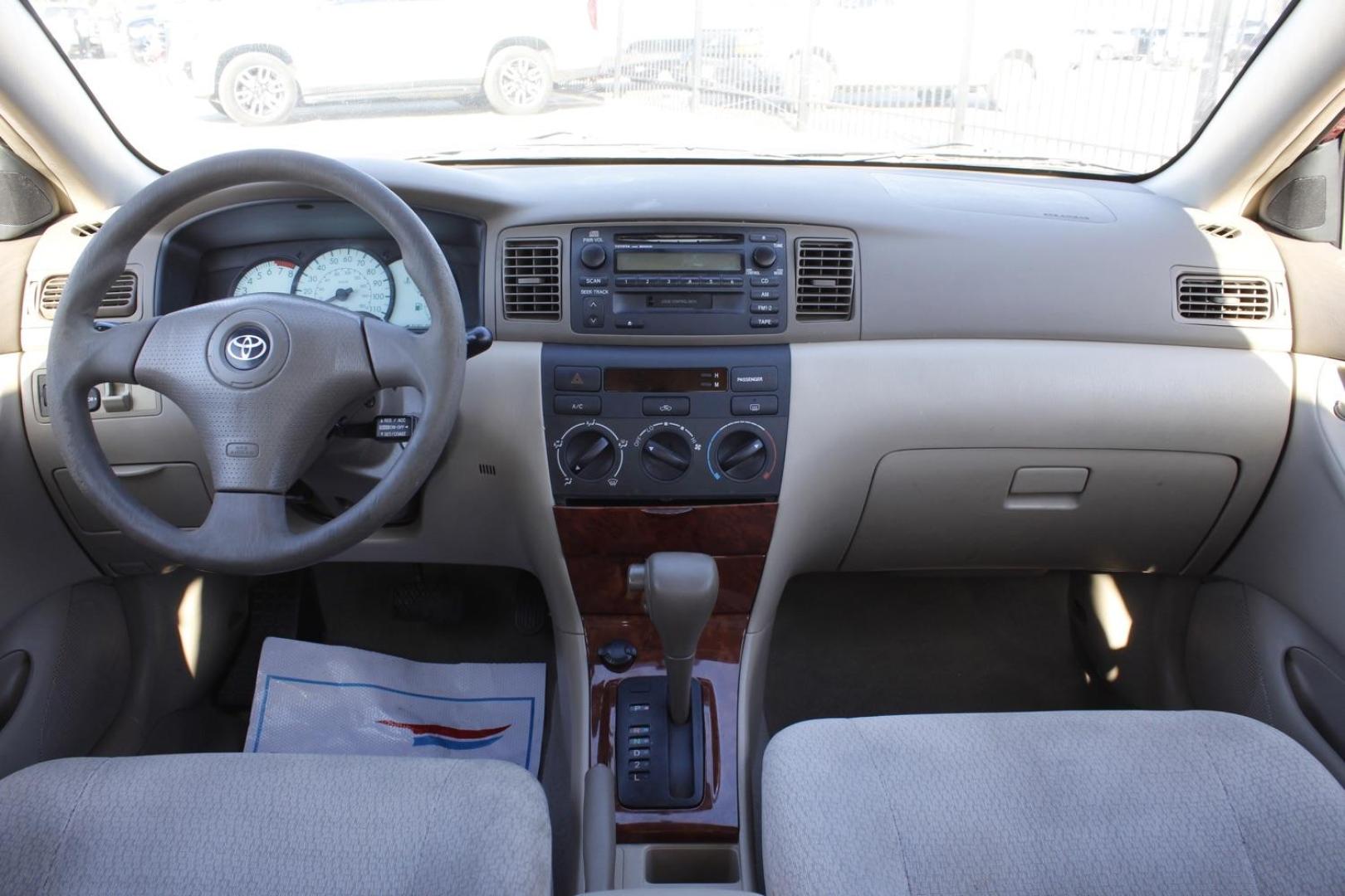 2004 red Toyota Corolla LE (1NXBR32E64Z) with an 1.8L L4 DOHC 16V engine, located at 2401 E Main St., Grand Prairie, TX, 75050, (972) 262-4440, 32.748981, -96.969643 - Photo#14