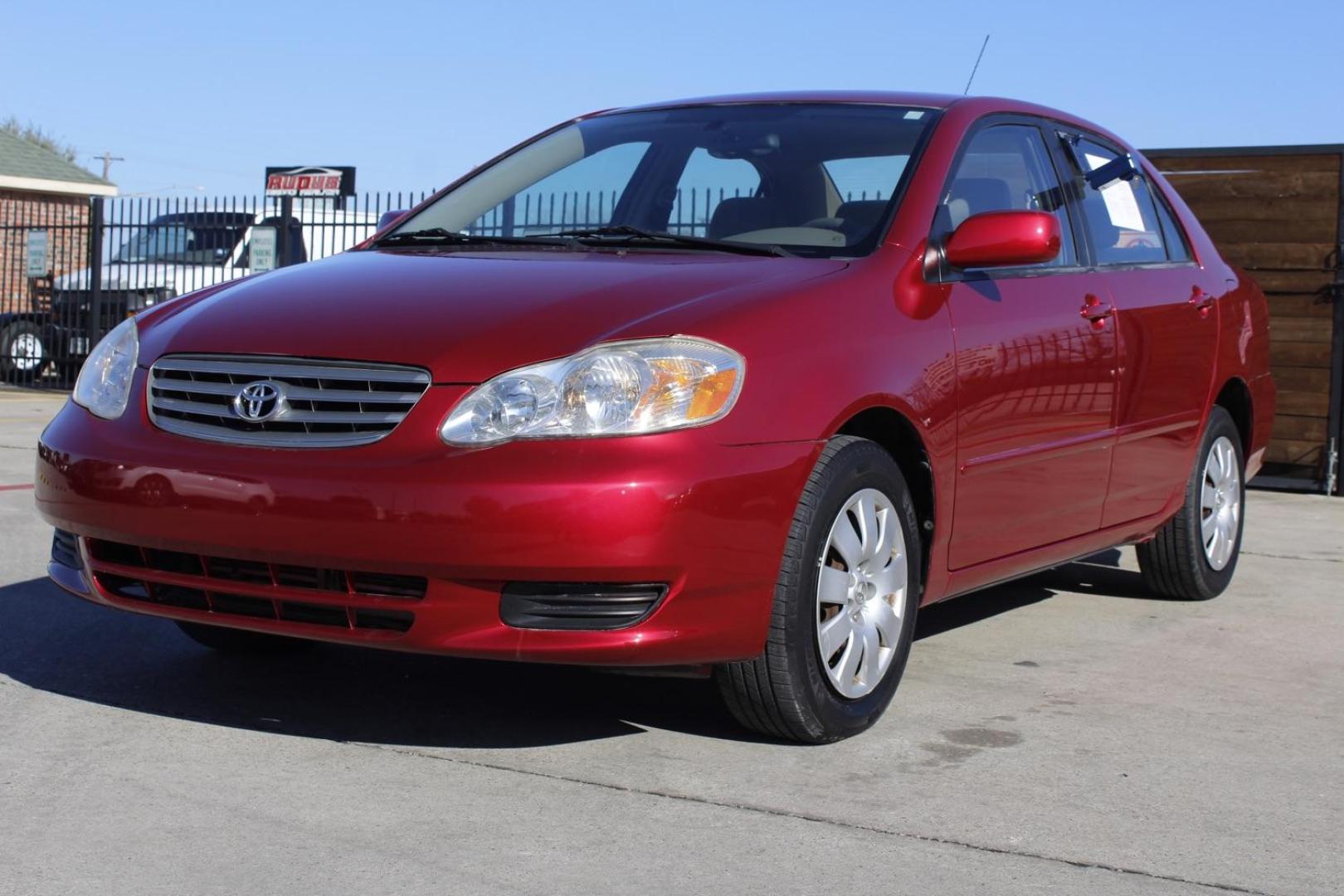 2004 red Toyota Corolla LE (1NXBR32E64Z) with an 1.8L L4 DOHC 16V engine, located at 2401 E Main St., Grand Prairie, TX, 75050, (972) 262-4440, 32.748981, -96.969643 - Photo#1