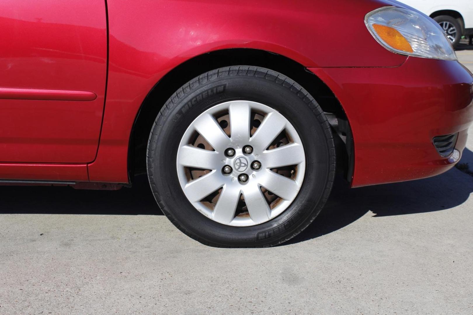 2004 red Toyota Corolla LE (1NXBR32E64Z) with an 1.8L L4 DOHC 16V engine, located at 2401 E Main St., Grand Prairie, TX, 75050, (972) 262-4440, 32.748981, -96.969643 - Photo#8