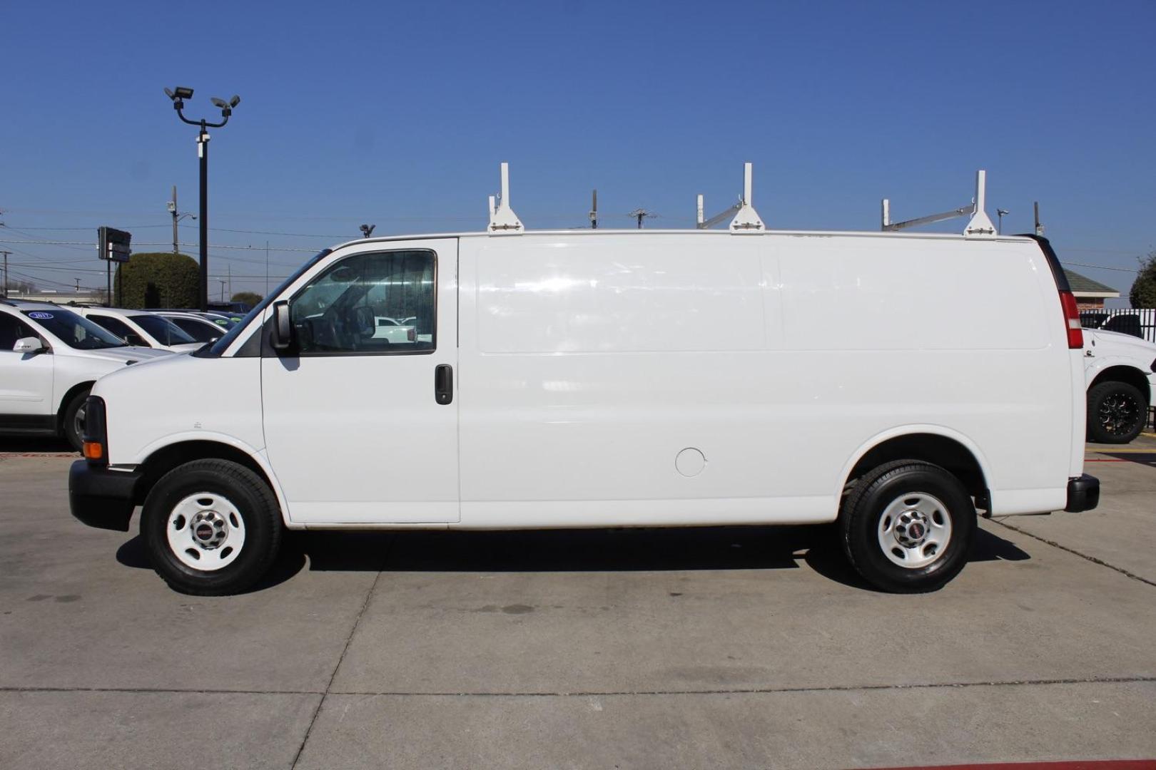 2014 WHITE GMC Savana G2500 Extended Cargo (1GTW7GCA7E1) with an 4.8L V8 OHV 16V FFV engine, 6-Speed Automatic transmission, located at 2401 E Main St., Grand Prairie, TX, 75050, (972) 262-4440, 32.748981, -96.969643 - Photo#1