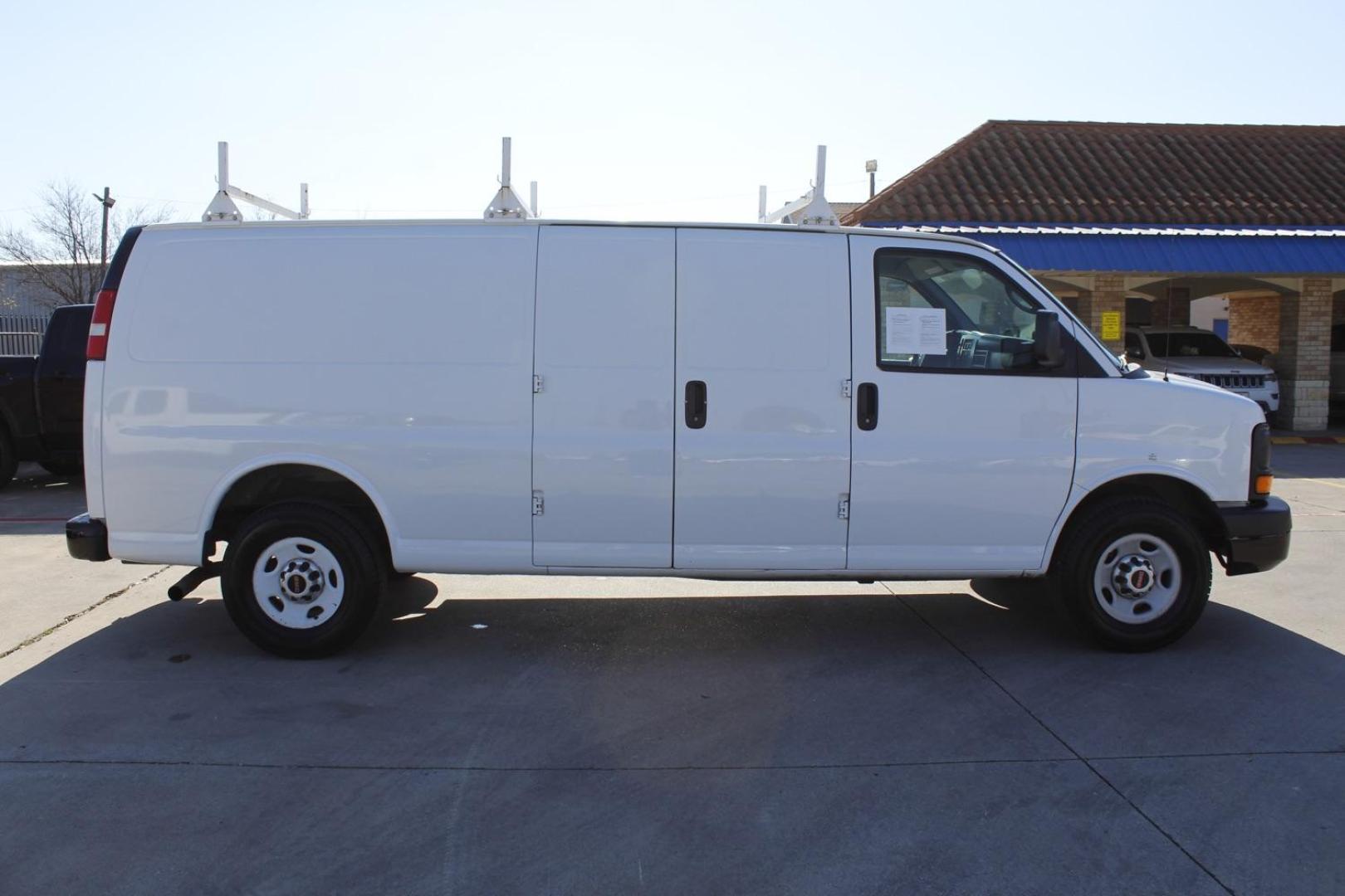 2014 WHITE GMC Savana G2500 Extended Cargo (1GTW7GCA7E1) with an 4.8L V8 OHV 16V FFV engine, 6-Speed Automatic transmission, located at 2401 E Main St., Grand Prairie, TX, 75050, (972) 262-4440, 32.748981, -96.969643 - Photo#6