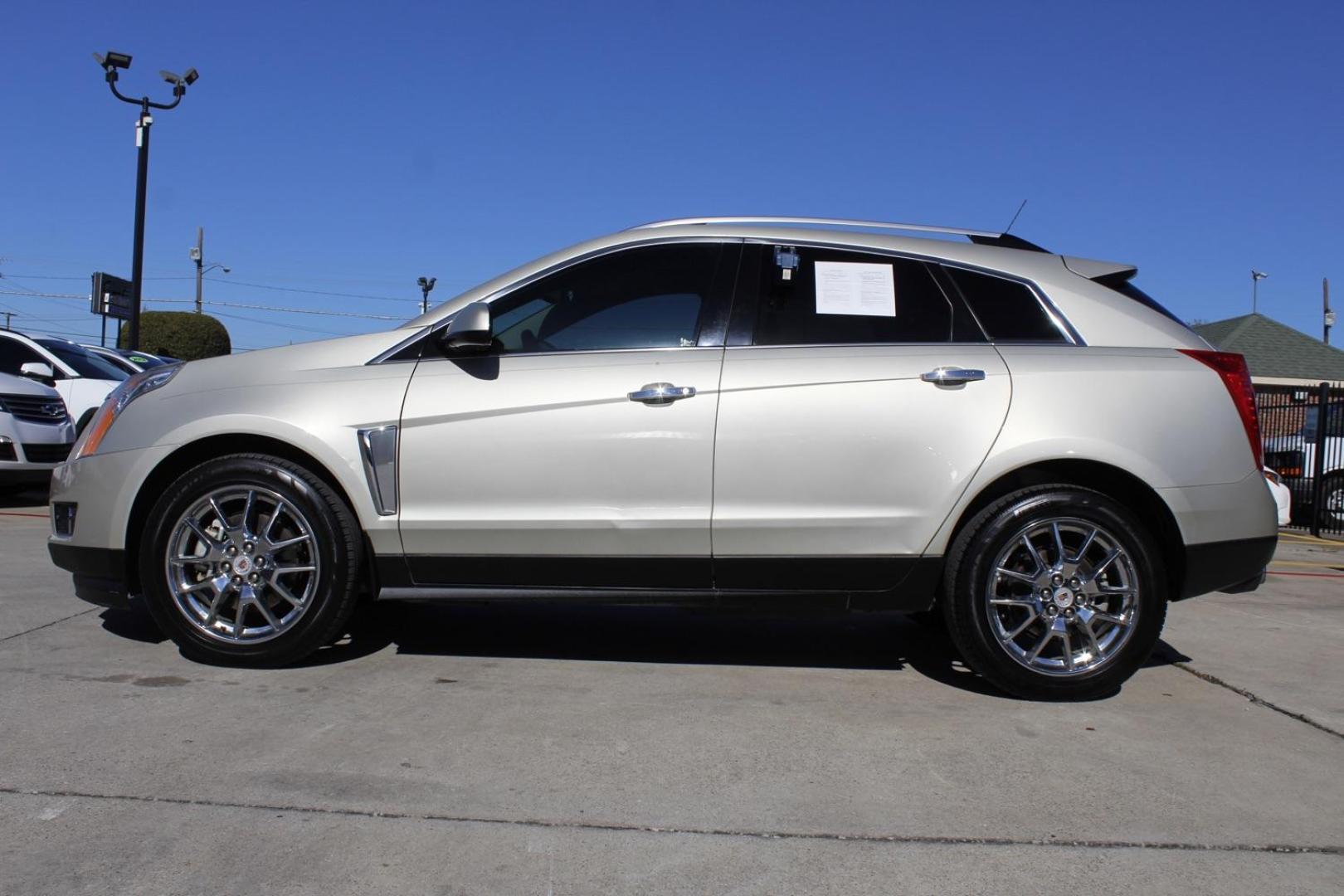 2013 GOLD Cadillac SRX Premium Collection (3GYFNEE38DS) with an 3.6L V6 DOHC 24V FFV engine, 6-Speed Automatic transmission, located at 2401 E Main St., Grand Prairie, TX, 75050, (972) 262-4440, 32.748981, -96.969643 - Photo#2