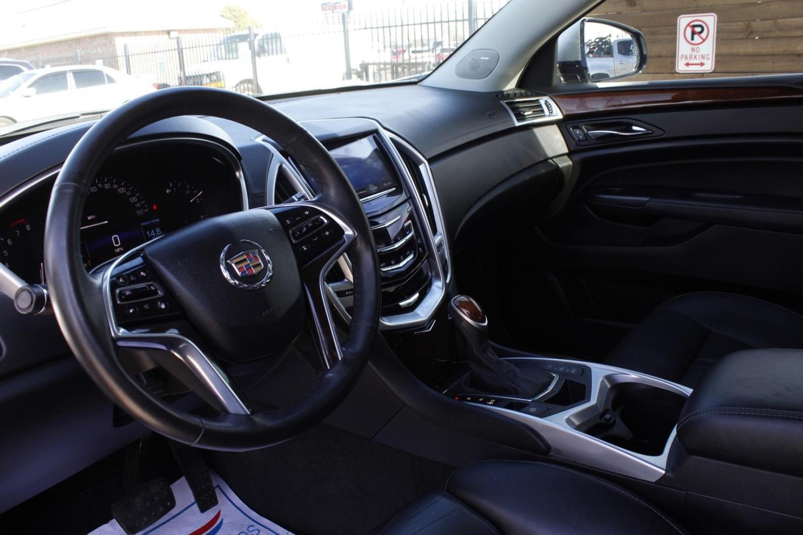 2016 silver Cadillac SRX Premium Collection FWD (3GYFNDE32GS) with an 3.6L V6 DOHC 24V FFV engine, 6-Speed Automatic transmission, located at 2401 E Main St., Grand Prairie, TX, 75050, (972) 262-4440, 32.748981, -96.969643 - Photo#12