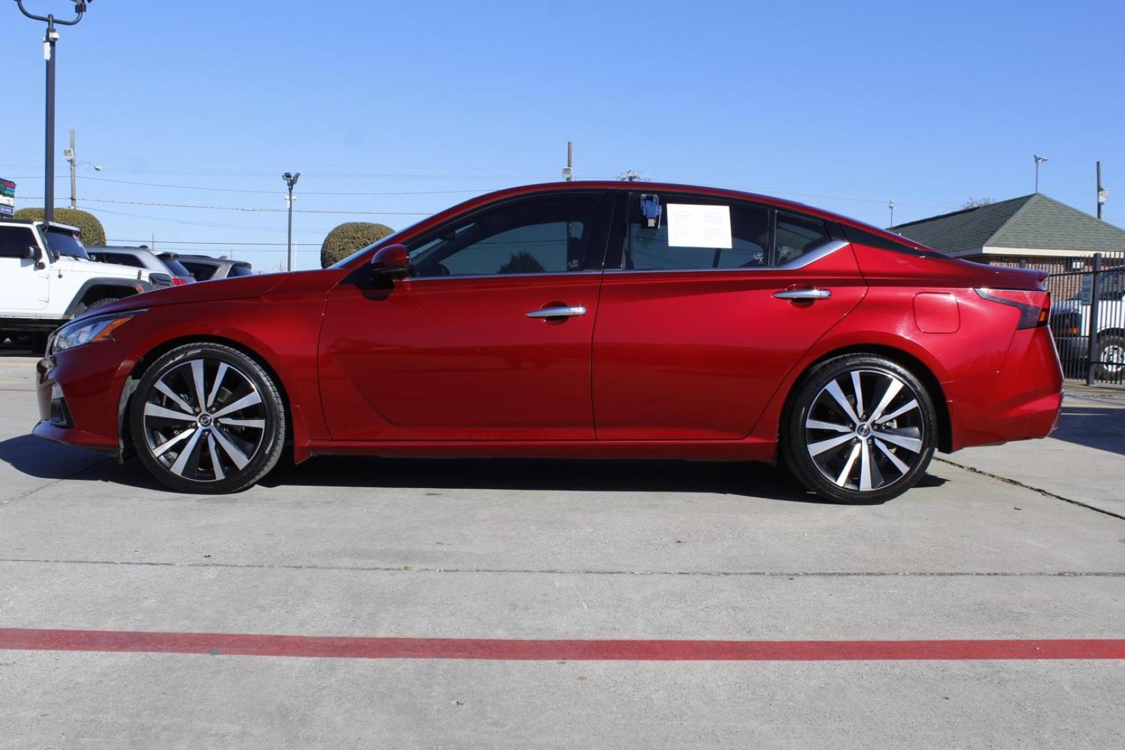 2019 Red Nissan Altima VC-T Platinum (1N4AL4FV6KC) with an 2.0L L4 DOHC 16V TURBO engine, Continuously Variable Transmission transmission, located at 2401 E Main St., Grand Prairie, TX, 75050, (972) 262-4440, 32.748981, -96.969643 - Photo#0