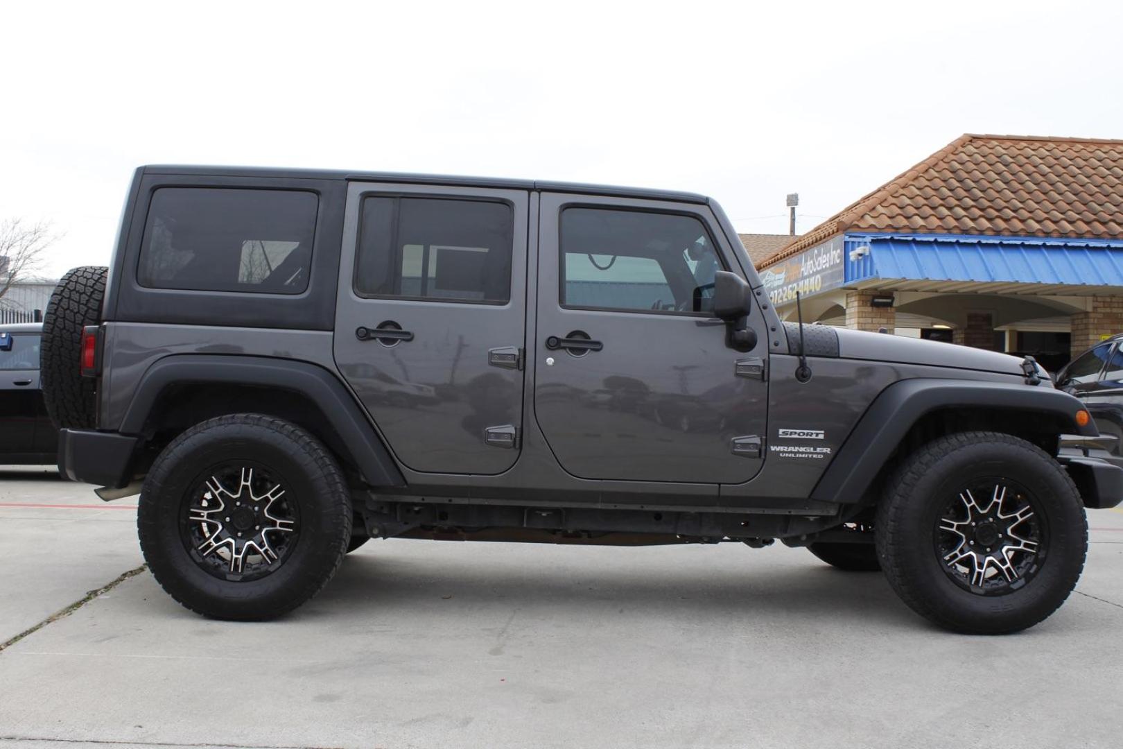 2017 Gray Jeep Wrangler Unlimited Sport 4WD (1C4BJWDG3HL) with an 3.6L V6 DOHC 24V FFV engine, located at 2401 E Main St., Grand Prairie, TX, 75050, (972) 262-4440, 32.748981, -96.969643 - Photo#9