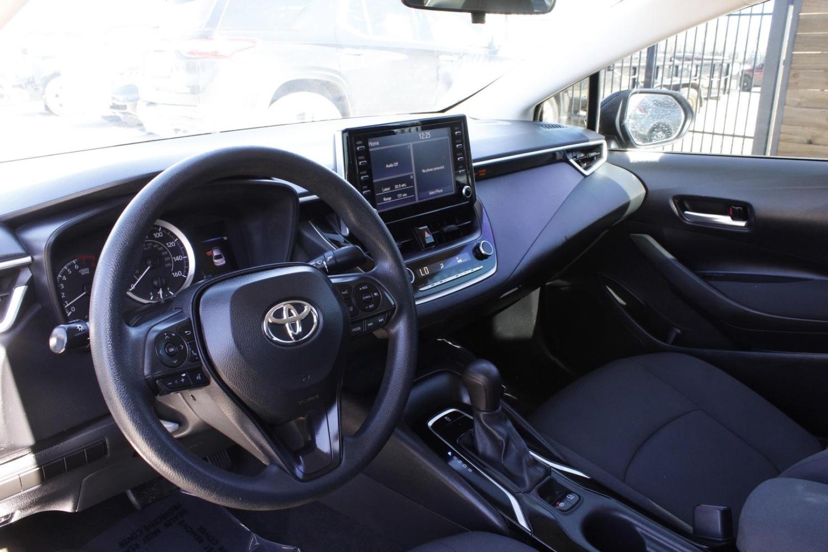 2020 Black Toyota Corolla LE (5YFEPRAE5LP) with an 1.8L engine, located at 2401 E Main St., Grand Prairie, TX, 75050, (972) 262-4440, 32.748981, -96.969643 - Photo#12