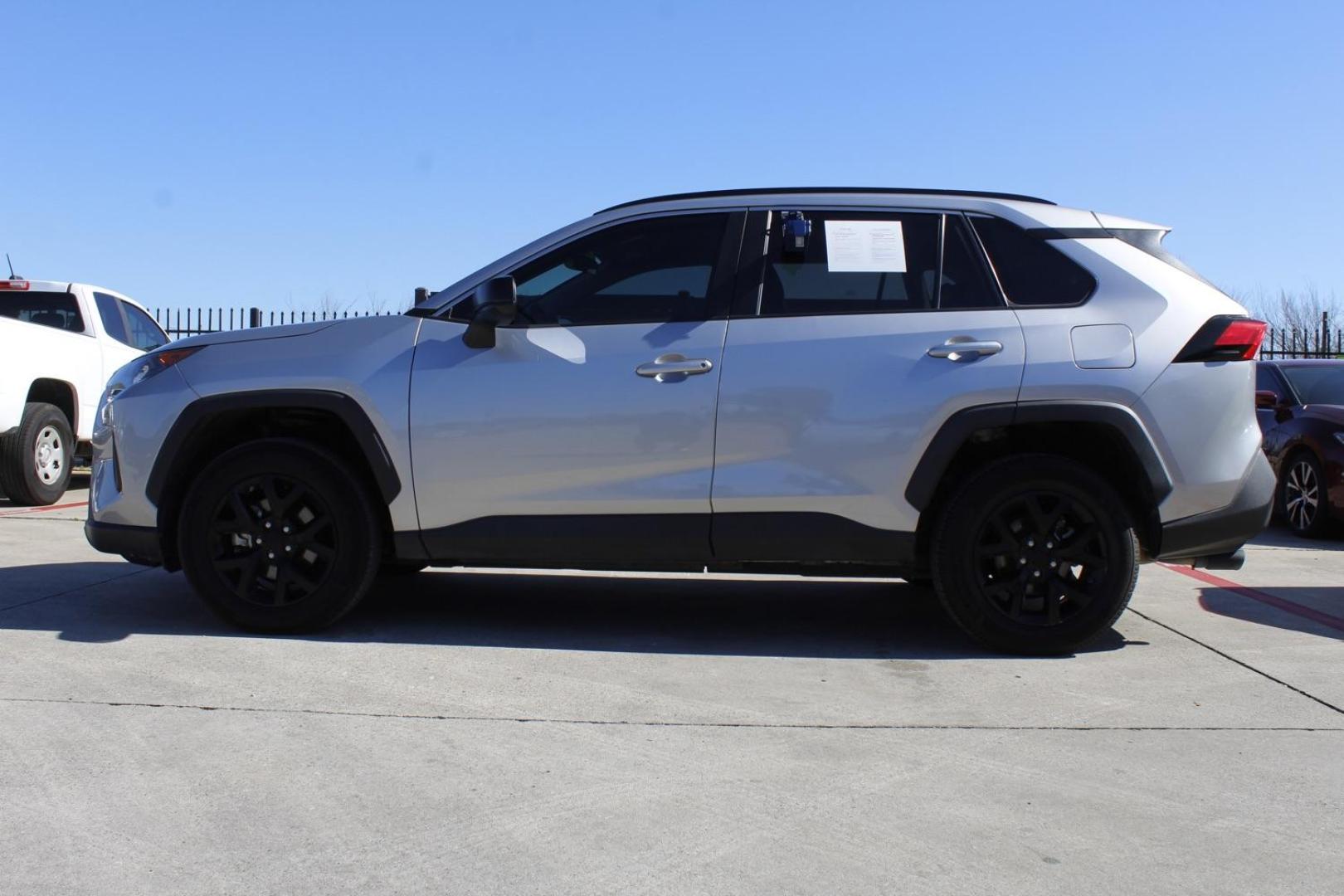 2021 Silver Toyota RAV4 LE (2T3H1RFV5MC) with an 2.5L L4 DOHC 16V engine, 8-Speed Automatic transmission, located at 2401 E Main St., Grand Prairie, TX, 75050, (972) 262-4440, 32.748981, -96.969643 - Photo#2