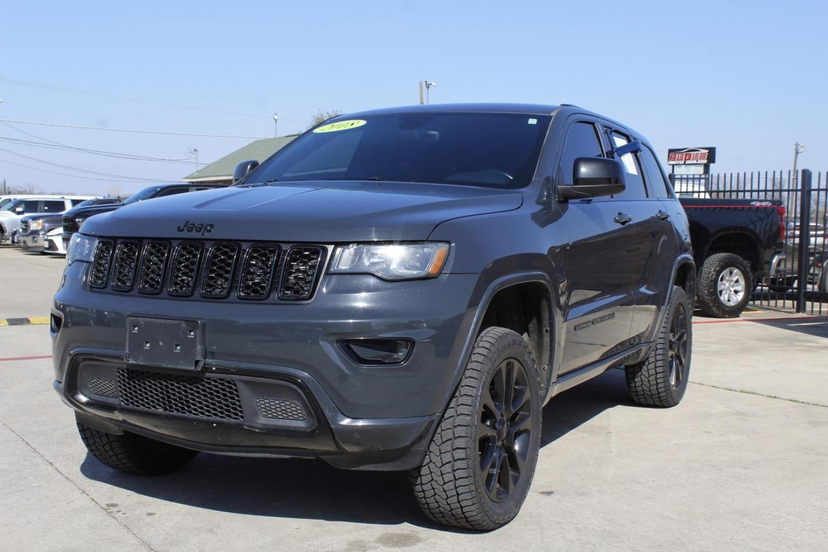 2018 Gray Jeep Grand Cherokee Laredo 4WD (1C4RJFAG5JC) with an 3.6L V6 DOHC 24V engine, 8-Speed Automatic transmission, located at 2401 E Main St., Grand Prairie, TX, 75050, (972) 262-4440, 32.748981, -96.969643 - Photo#1