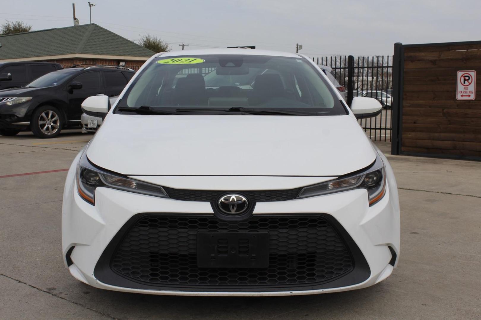 2021 White Toyota Corolla LE (5YFEPMAEXMP) , located at 2401 E Main St., Grand Prairie, TX, 75050, (972) 262-4440, 32.748981, -96.969643 - Photo#0