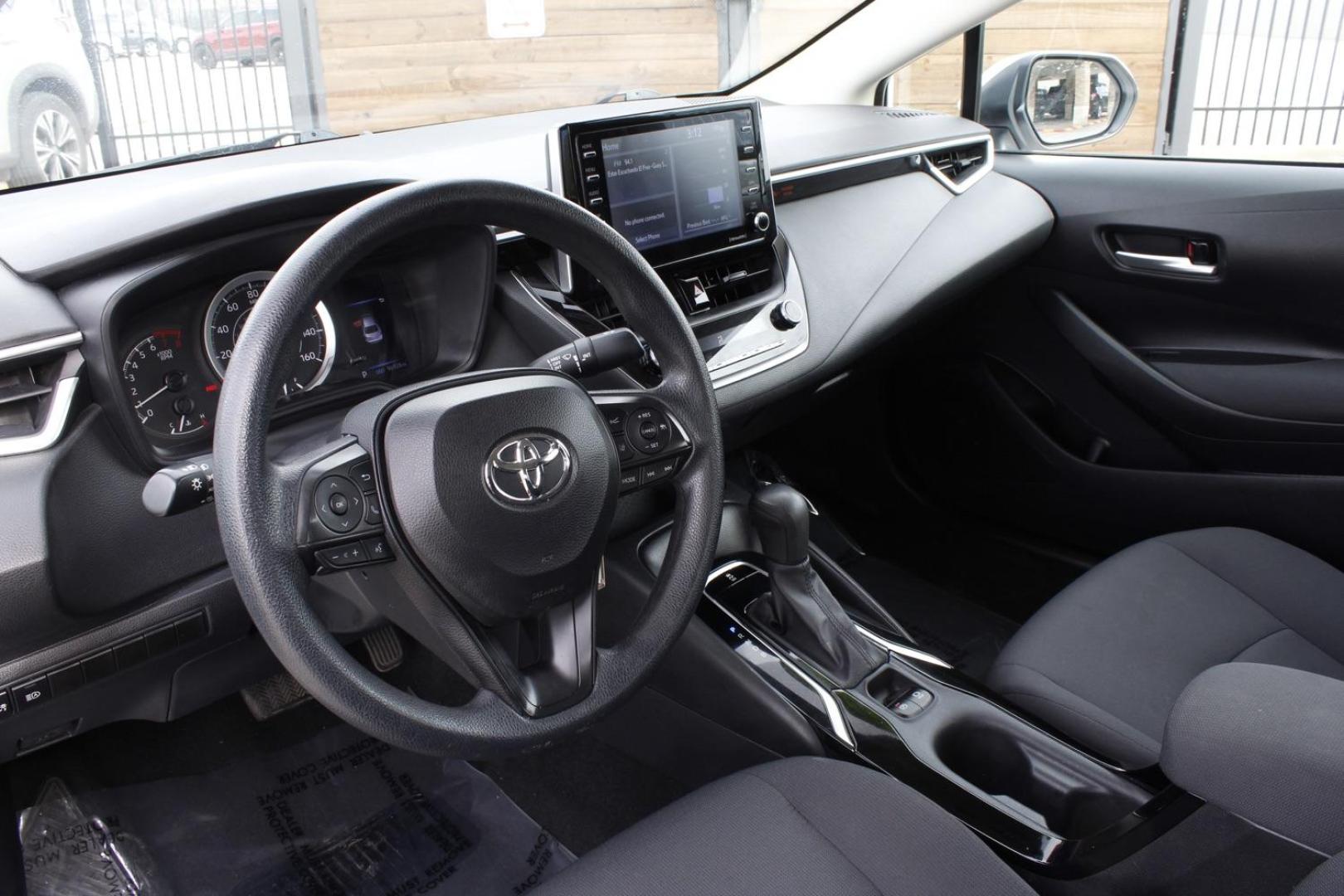 2021 White Toyota Corolla LE (5YFEPMAEXMP) , located at 2401 E Main St., Grand Prairie, TX, 75050, (972) 262-4440, 32.748981, -96.969643 - Photo#12