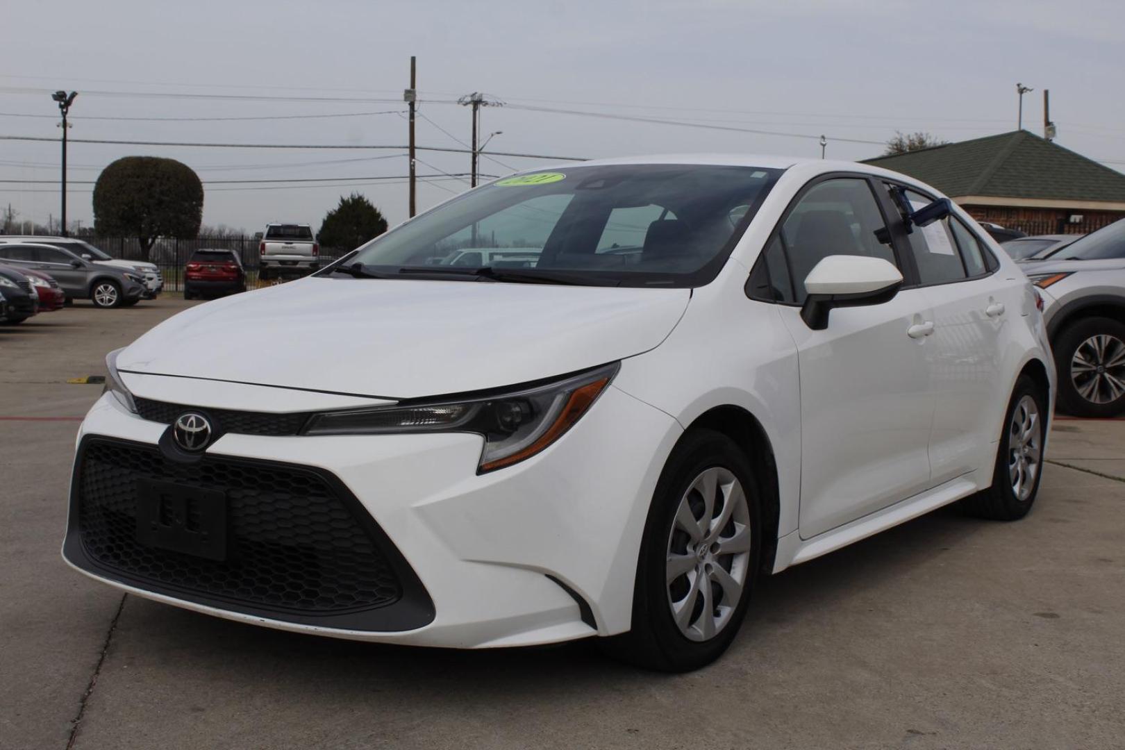 2021 White Toyota Corolla LE (5YFEPMAEXMP) , located at 2401 E Main St., Grand Prairie, TX, 75050, (972) 262-4440, 32.748981, -96.969643 - Photo#1